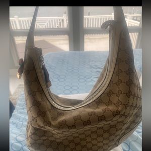 Classic Gucci one shoulder canvas and leather bag